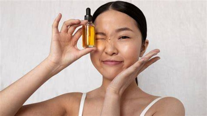 Should I oil my face at night?